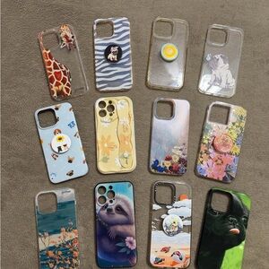Lot of 12 IPhone 14 Pro Max Phone Cases - 5 with Pop Sockets. Good condition!!
